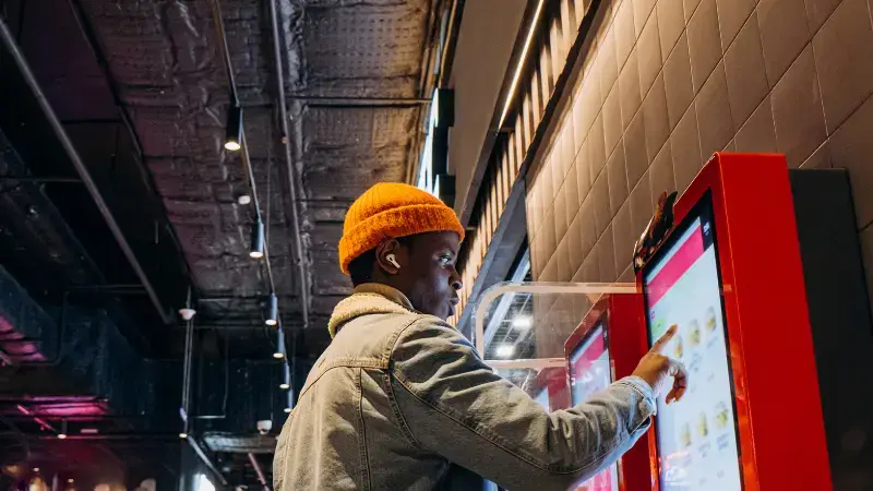 Ordering food at a self-service restaurant