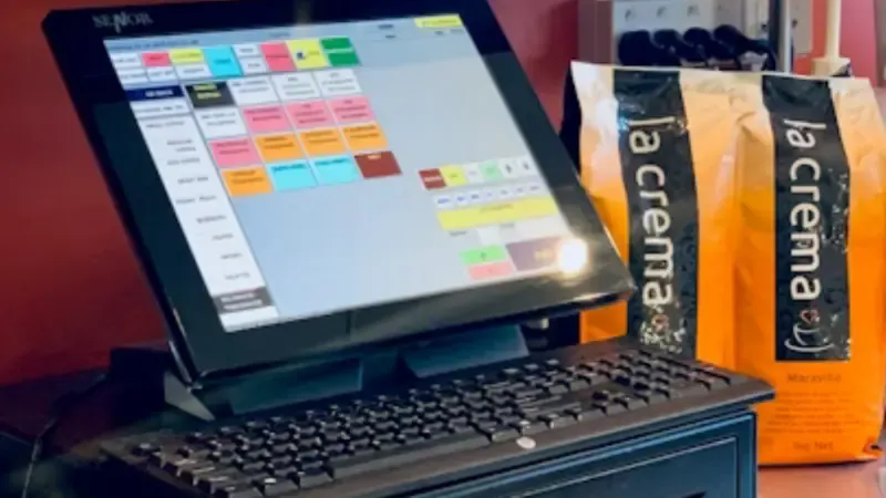 A cash register in a retail store