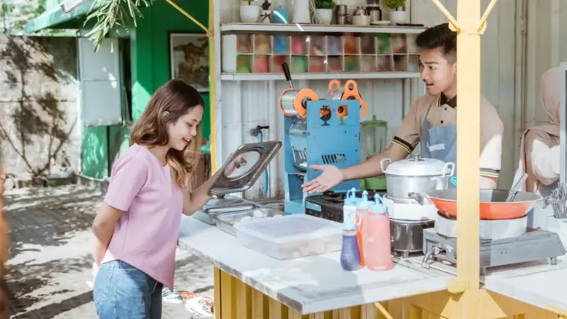 Customer paying manually at a local store