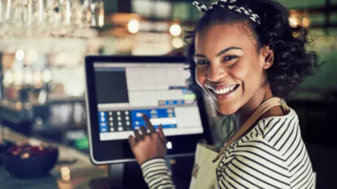 A customer using a POS system