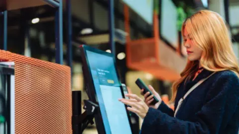 Price checker in a supermarket