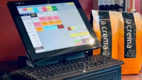 A cash register in a retail store