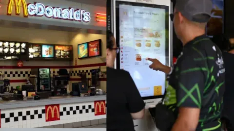 A customer ordering at McDonald’s self-order kiosk